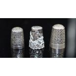 Three sterling silver thimbles