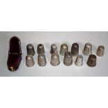 Thirteen various sterling silver thimbles