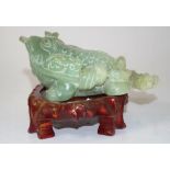 Large carved stone frog with crown