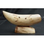 Antique whale tooth scrimshaw