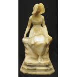 Edwardian alabaster figure of seated lady