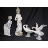 Four Lladro figurines & 1 other
