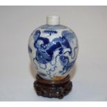 Small Chinese blue and white vase on stand