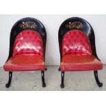 Pair of black lacquered oriental lounge chairs