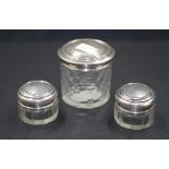 Three sterling silver lidded toiletry jars