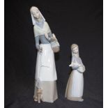 Lladro standing woman with dog figure