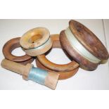 Five vintage wooden fishing reels