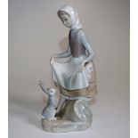 Lladro young lady with a rabbit figurine