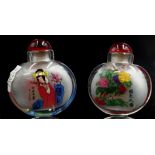 Two Chinese glass painted snuff bottles