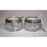 Pair of sterling silver rimmed salt cellars