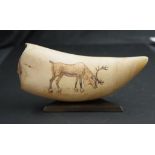 Antique whale tooth scrimshaw