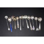 Twelve various sterling silver salt spoons