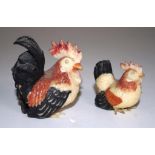 Two Oriental rooster figures
