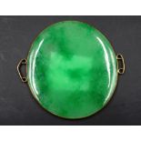 Chinese carved greenstone circular pendant