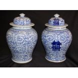 Pair Chinese blue & white lidded vases