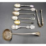 Quantity of souvenir teaspoons including silver