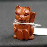 Japanese boxwood netsuke carving of a lucky cat