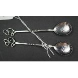 Two Australian sterling silver hand beaten spoons