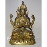 Tibetan brass seated Buddha figure