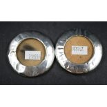Two sterling silver small round picture frames