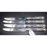 Four sterling silver handle dinner knives