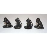 Group Oriental animal form bronzed opium weights