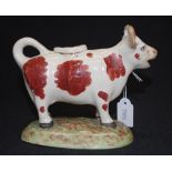 Antique painted ceramic cow figure creamer