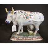 Large antique hand painted ceramic cow figure