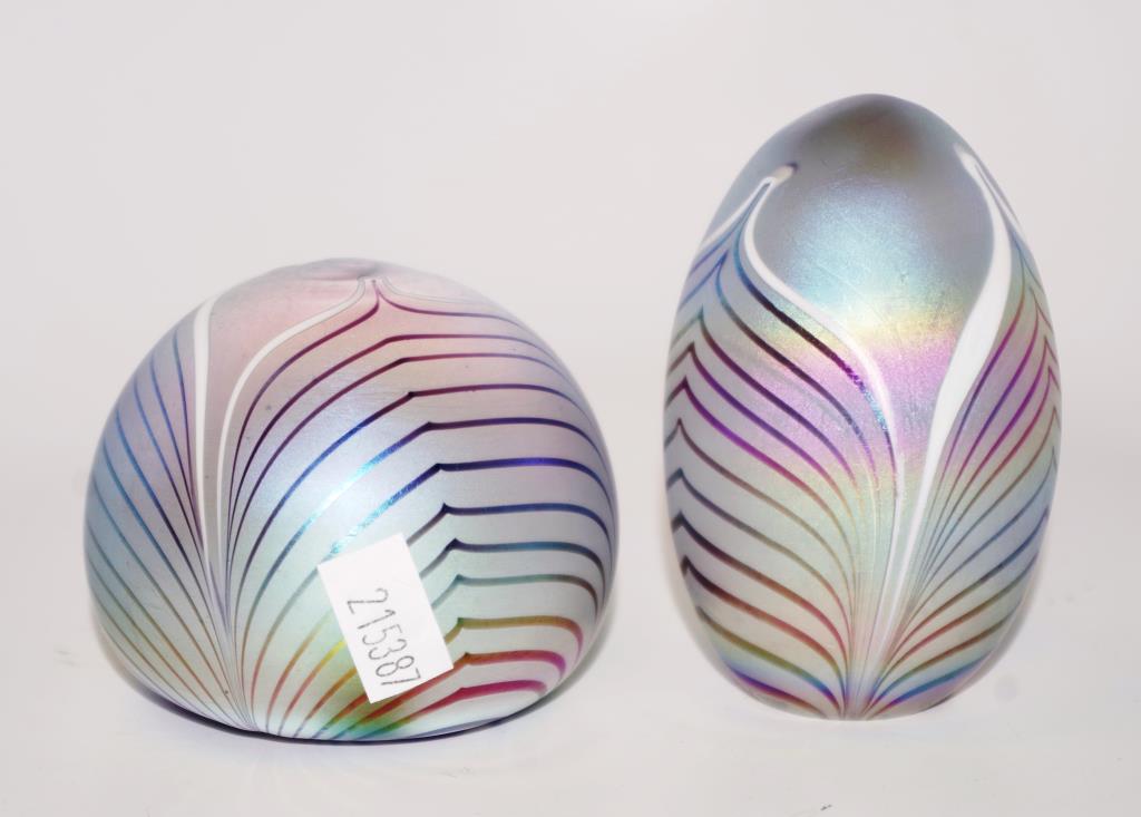 Two glass paperweight with iridescent colours