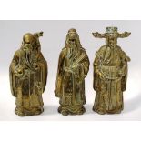 Three Chinese brass Immortal figures