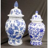 Two decorative Blue and White lidded urns