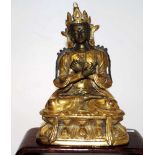 Good Tibetan brass seated Buddha figure