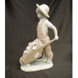 Lladro boy with wheelbarrow and flowers