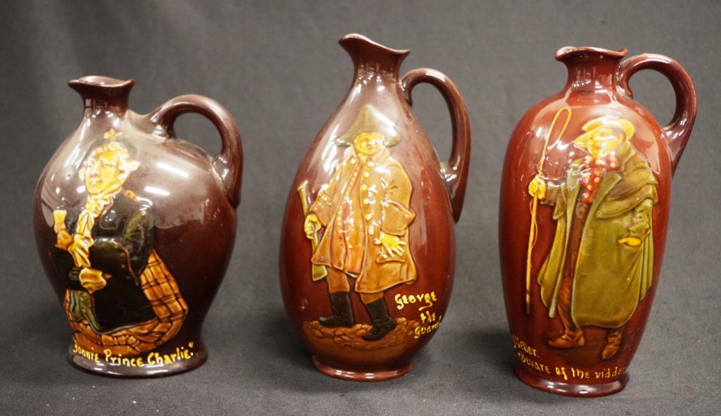 Three Royal Doulton Dewar's Kingsware jugs