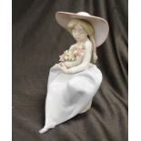 Lladro girl with fragrant bouquet