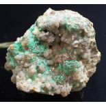 Natural malachite on a cluster of quartz crystals