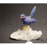 Lapis Lazuli carved bird on a crystal form base