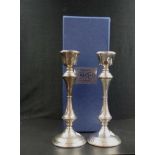 Pair of sterling silver candlesticks