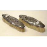 Pair George V silver backed clothes brushes