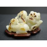 Chinese carved jade Foo dog figure group