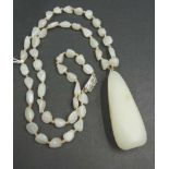 Chinese white jade toggle pendant on bead strand