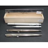 Two Parker silver plated ball point pens