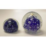 Two Australian art glass paperweights