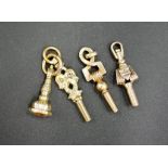 Four 19th century 14ct gold cased watch keys