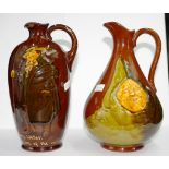 Two Royal Doulton Kingsware Dewar's whisky jugs