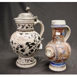 Two various German 'Motto Ware' ceramic jugs