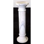 White marble column pedestal stand