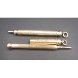 Two gold plated mechanical pencils