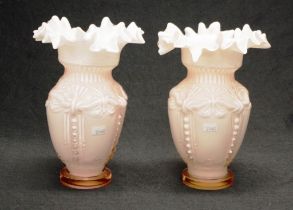 Pair of pink cased glass vases