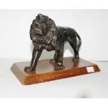 Silvered metal figure of a lion